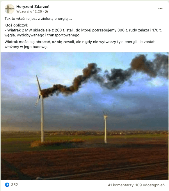 Wpis na Facebooku wyliczający energię potrzebną do uruchomienia turbiny wiatrowej. Zdjęcie przedstawia pole, na którym stoją dwa białe wiatraki. Z jednego z nich uchodzi dym. Niebo jest pochmurne. W tle widoczna jest najprawdopodobniej mała miejscowość.