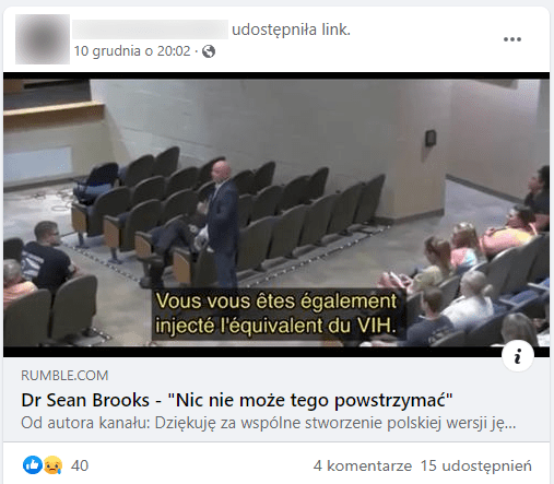 Zrzut ekranu posta na Facebooku, w którym udostępniono omawiany film. W kadrze widzimy salę z krzesłami ustawionymi w rzędach. Na środku stoi mężczyzna w garniturze - Sean Brooks.