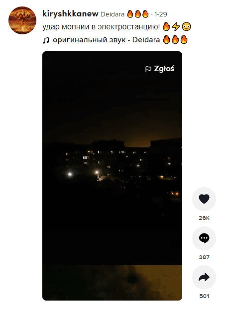 Zrzut ekranu omawianego Tik Toka. Na nagraniu widoczne jest zaciemnione miasto, światła wydobywają się zza okien widocznych w oddali budynków i ulicznych lamp.