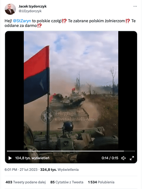 Wpis na Twitterze z dołączonym nagraniem. W kadrze widać kilka czołgów ustawionych w kolumnie - każdy z nich ma podpiętą czerwono-czarną flagę. Na nagraniu jest także widoczny znak wodny “Telegram @britishintelligence”.