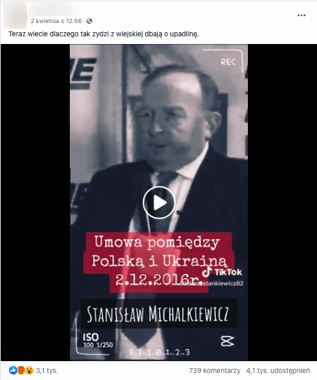 Zrzut ekranu posta na Facebooku, w którym zamieszczono omawiane nagranie z udziałem Michalkiewicza. Widoczny jest mężczyzna w białej koszuli, marynarce, pod krawatem. 