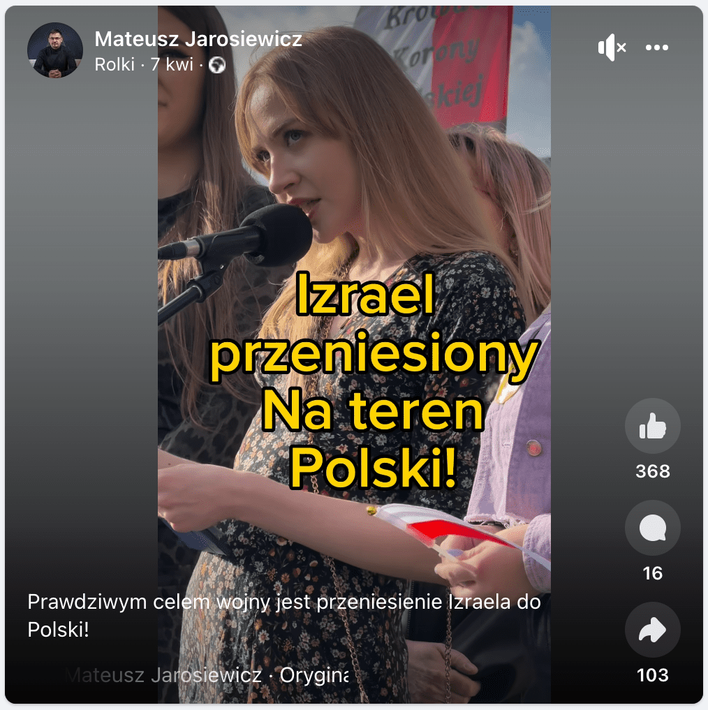 Zrzut ekranu rolki udostępnionej na Facebooku. W kadrze nagrania jest młoda kobieta mówiąca do mikrofonu. Ubrana jest w sukienkę w kwiaty. Obok niej stoją ludzie, jedna osoba ma w rękach flagę polski.