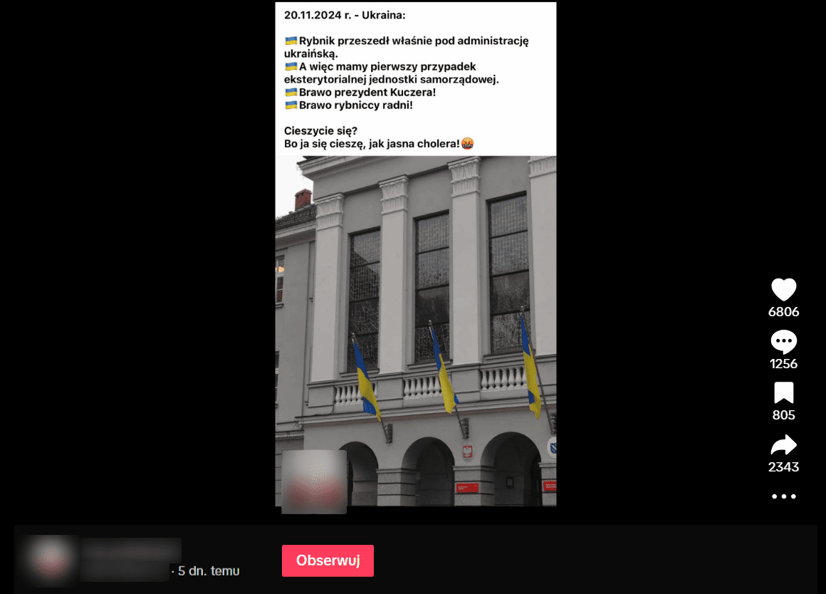 Zrzut ekranu z posta na TikToku. Szary budynek, na którym widzą ukraińskie flagi. 