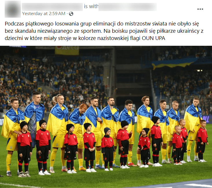 Zrzut ekranu z posta na Facebooku. Na zdjęciu piłkarze w żółtych strojach przewiązani flagami Ukrainy. Przed nimi dzieci w strojach w kolorze czerwono-czarnym.