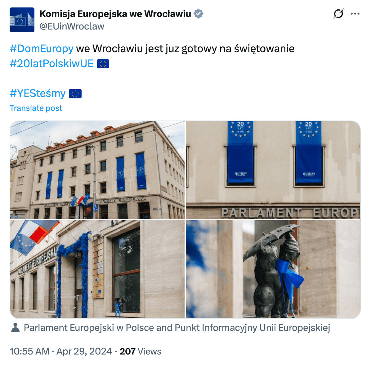 Zrzut ekranu przedstawiający post z portalu X.com. Wpis opublikowano przed świętowaniem 20-lecia Polski w Unii na oficjalnym profilu Komisji Europejskiej we Wrocławiu. Do postu dołączono zdjęcia budynku PE we Wrocławiu. Na gmachu powiewają flagi Unii i flaga Polski.