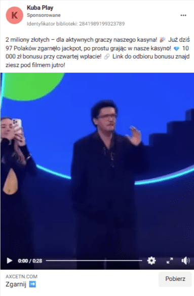 Reklama na Facebooku zachęcająca do pobrania oprogramowania. W dołączonym do niej nagraniu widzimy Kubę Wojewódzkiego stojącego na niebieskim tle.